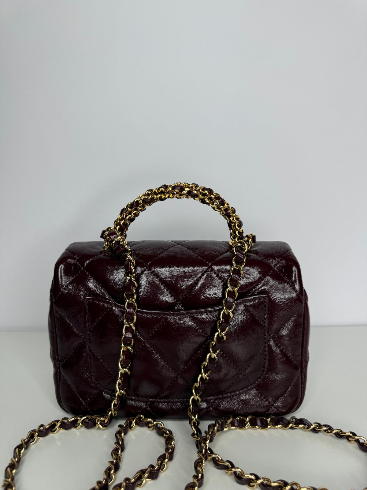 Chanel Mini Top Handle Flap Bag in Burgundy Quilted Leather Gold Hardware