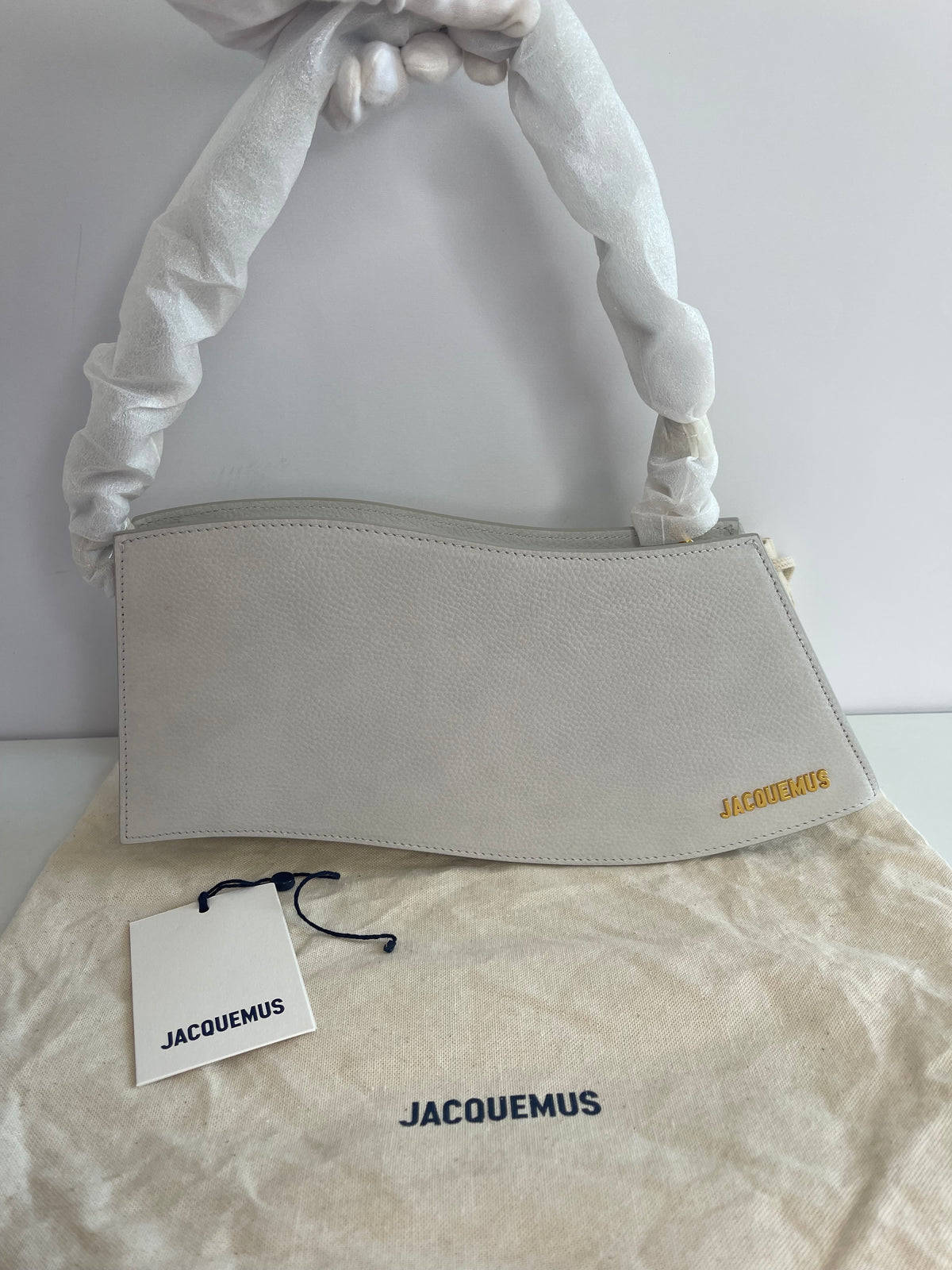 Jacquemus “la Vague” Asymmetric Light Grey Shoulder Bag