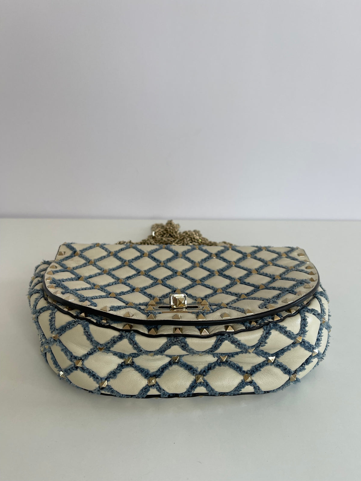 Valentino Garavani Rockstud Spike Halfmoon in Ivory Blue Round Bag