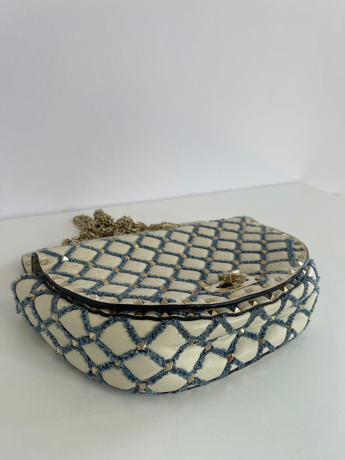 Valentino Garavani Rockstud Spike Halfmoon in Ivory Blue Round Bag