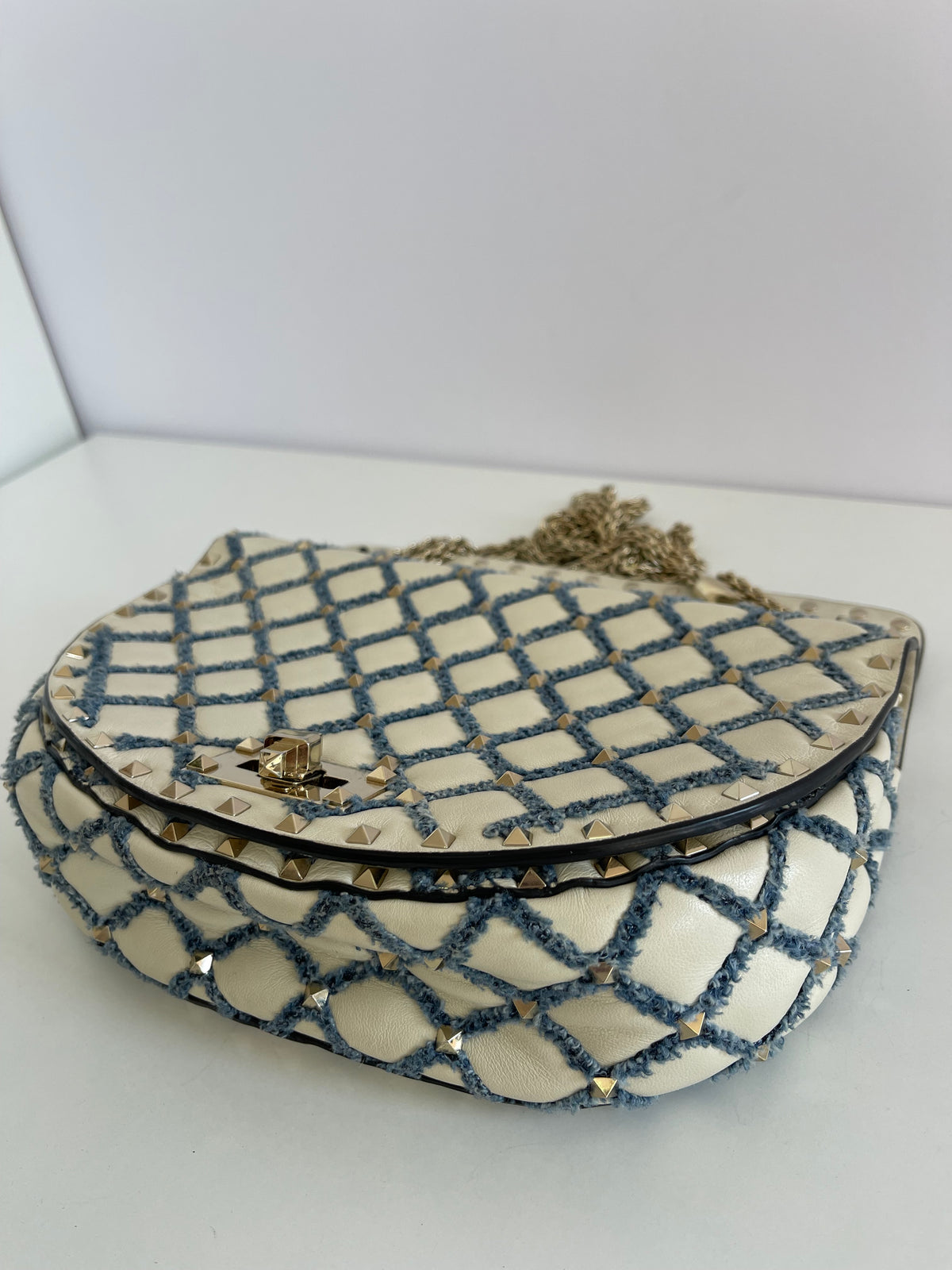 Valentino Garavani Rockstud Spike Halfmoon in Ivory Blue Round Bag