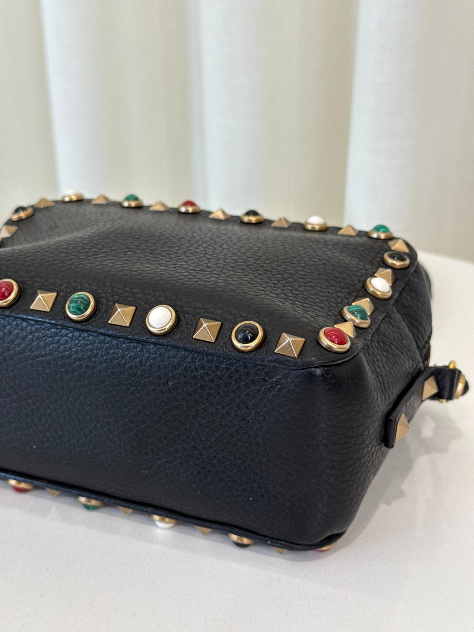 Valentino Garavani Black Pebbled Calfskin Rolling Rockstud Camera Bag