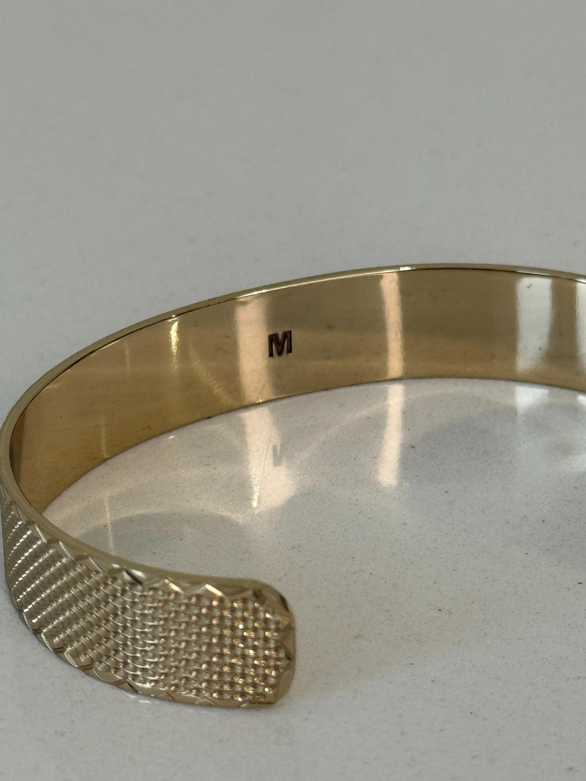 Christian Dior Code Bangle Gold-Finish Metal