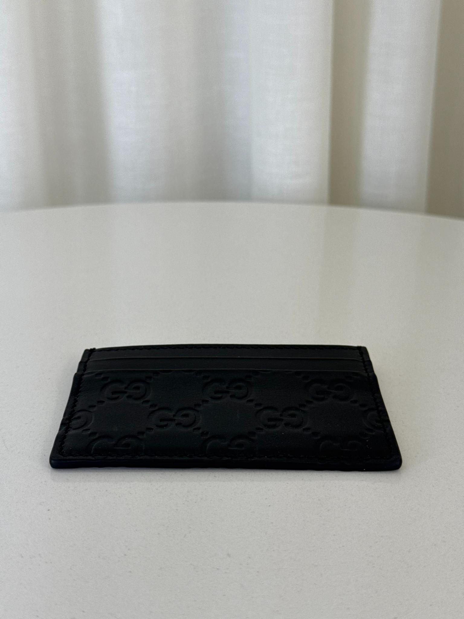 Gucci GG Emblem Black Embossed Leather Card Case