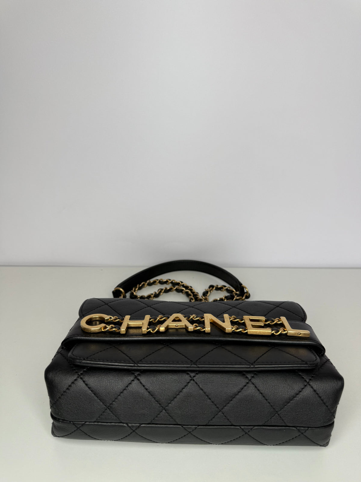 Chanel Logo Enchained Black Quilted Calfskin Flap Bag