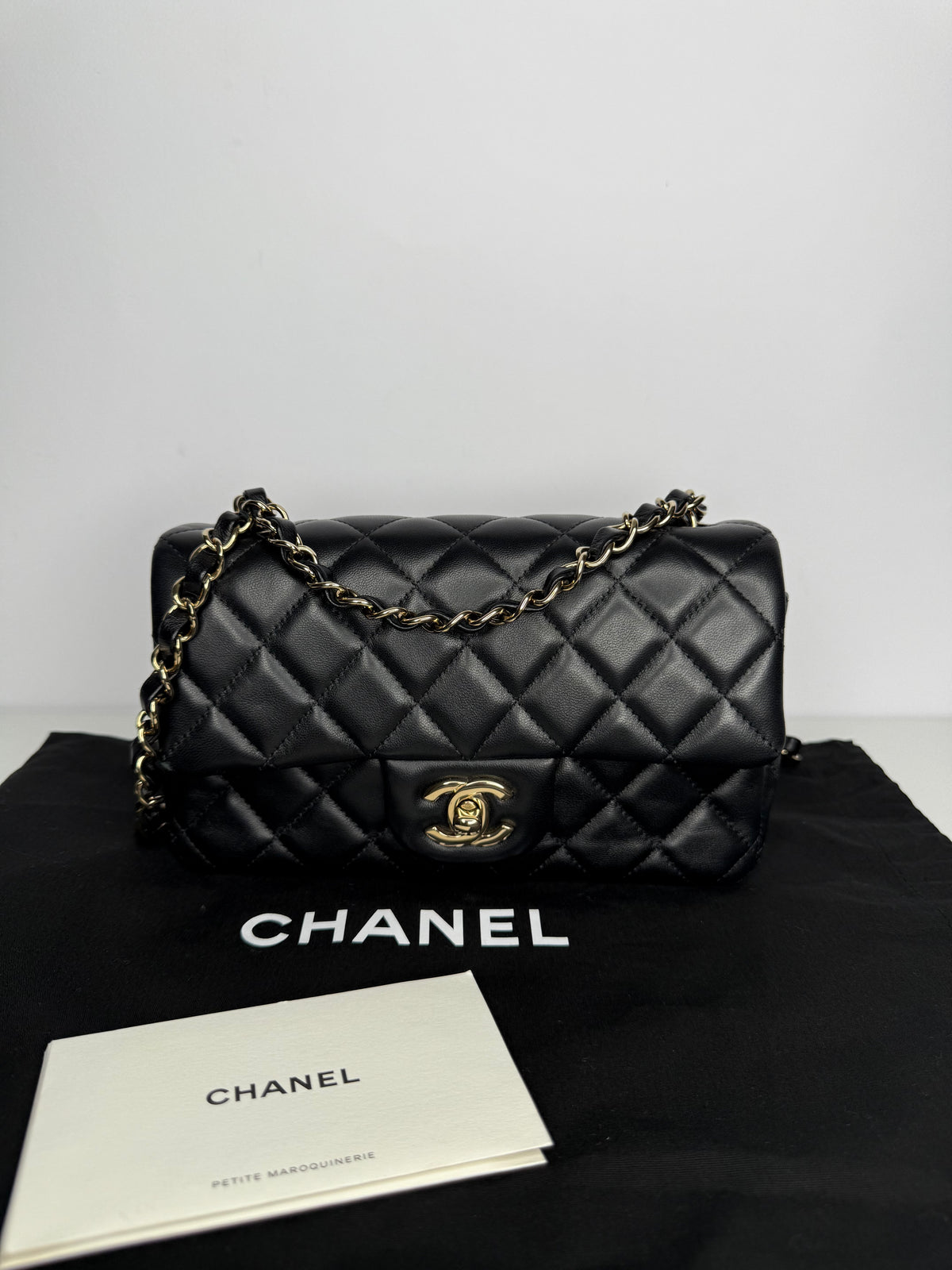 Chanel Classic Mini Rectangular in Black Lambskin Gold Hardware