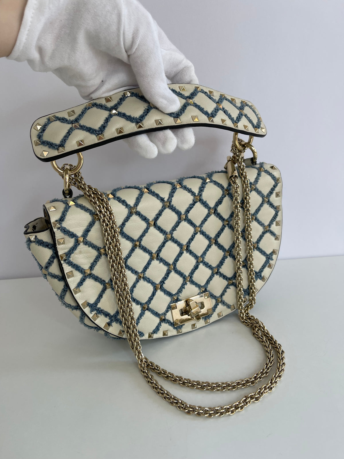 Valentino Garavani Rockstud Spike Halfmoon in Ivory Blue Round Bag
