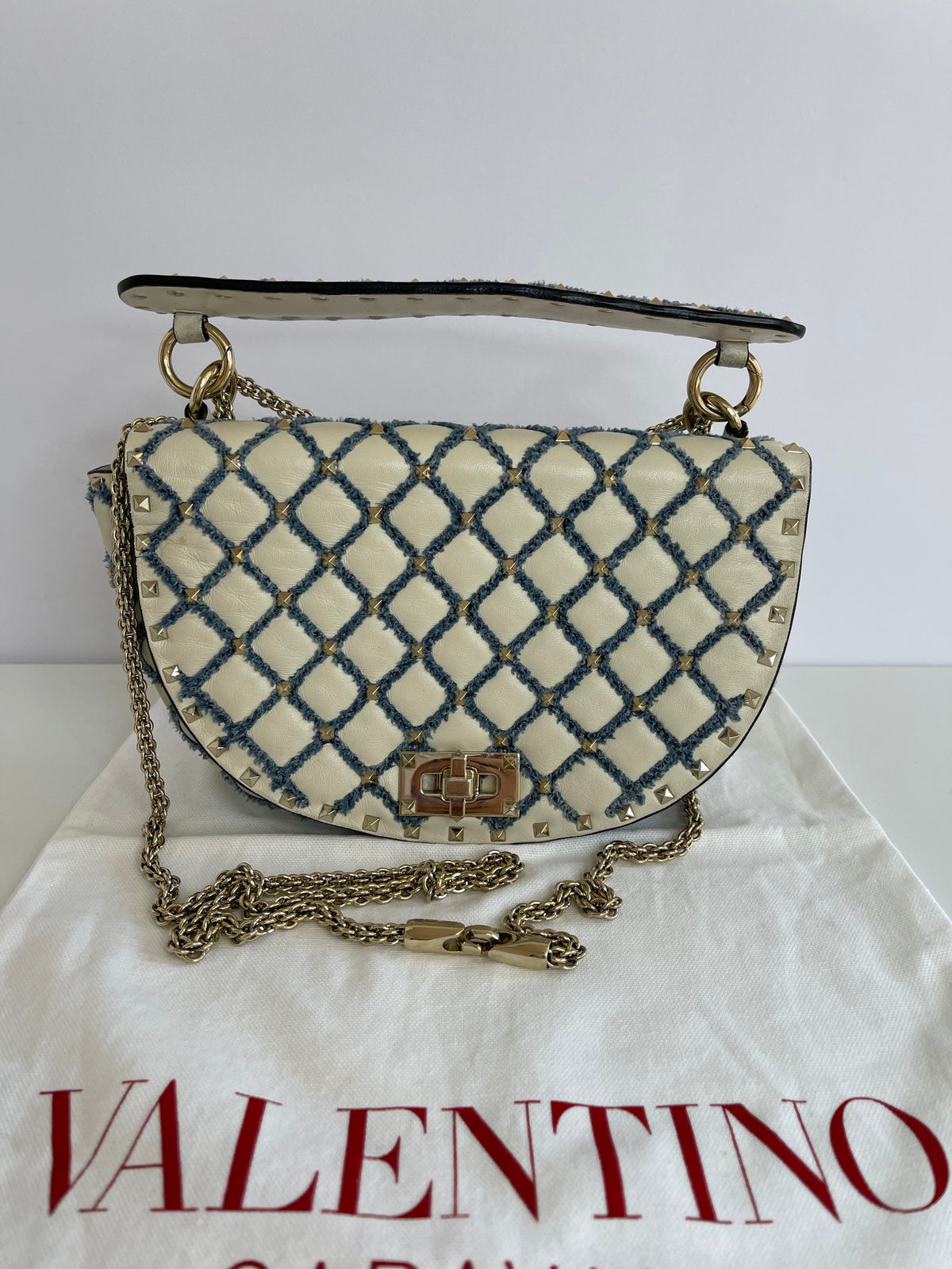 Valentino Garavani Rockstud Spike Halfmoon in Ivory Blue Round Bag