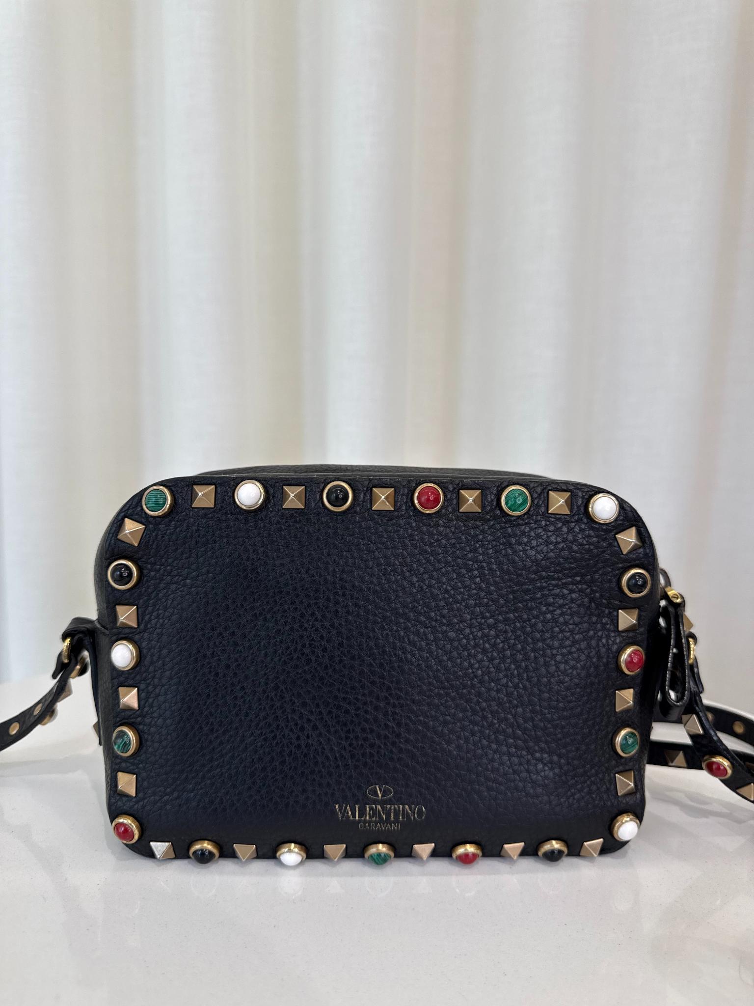 Valentino Garavani Black Pebbled Calfskin Rolling Rockstud Camera Bag