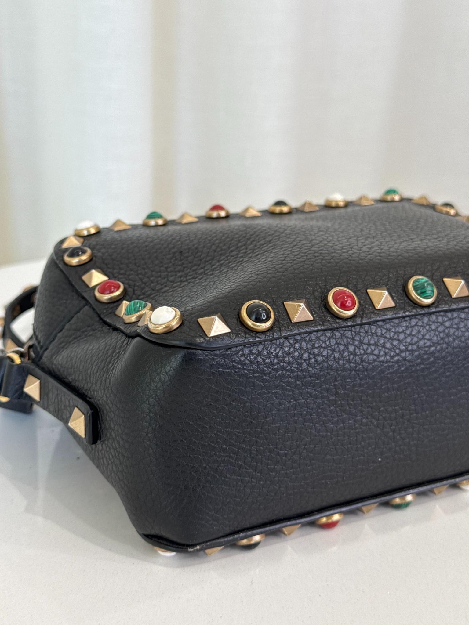 Valentino Garavani Black Pebbled Calfskin Rolling Rockstud Camera Bag