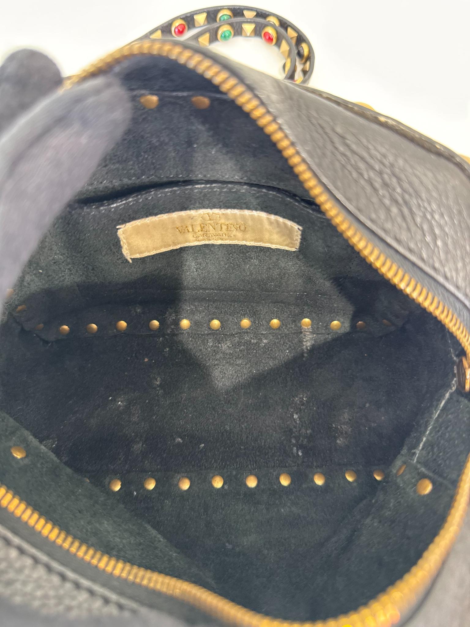 Valentino Garavani Black Pebbled Calfskin Rolling Rockstud Camera Bag