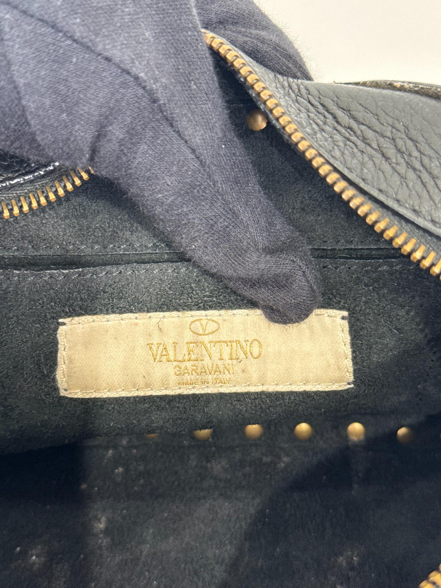 Valentino Garavani Black Pebbled Calfskin Rolling Rockstud Camera Bag
