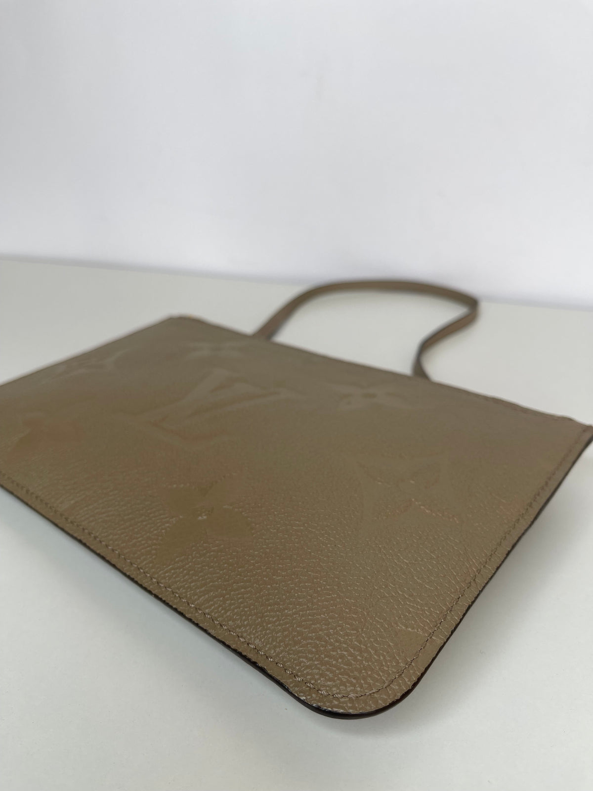 Louis Vuitton Monogram Empreinte Pochette Neverfull Tourterelle