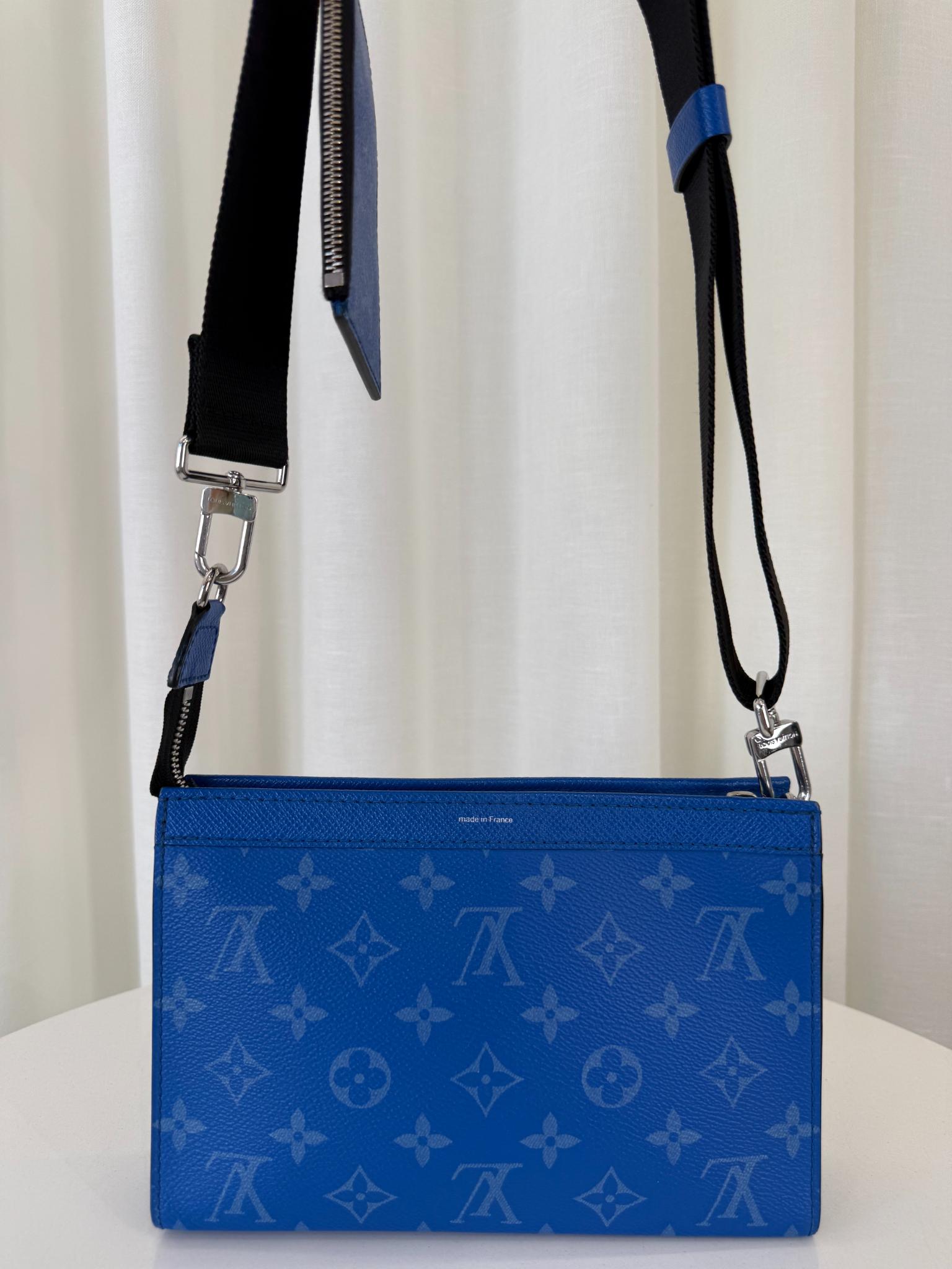 Louis Vuitton Men’s Gaston Wearable Wallet Blue Monogram Taigarama