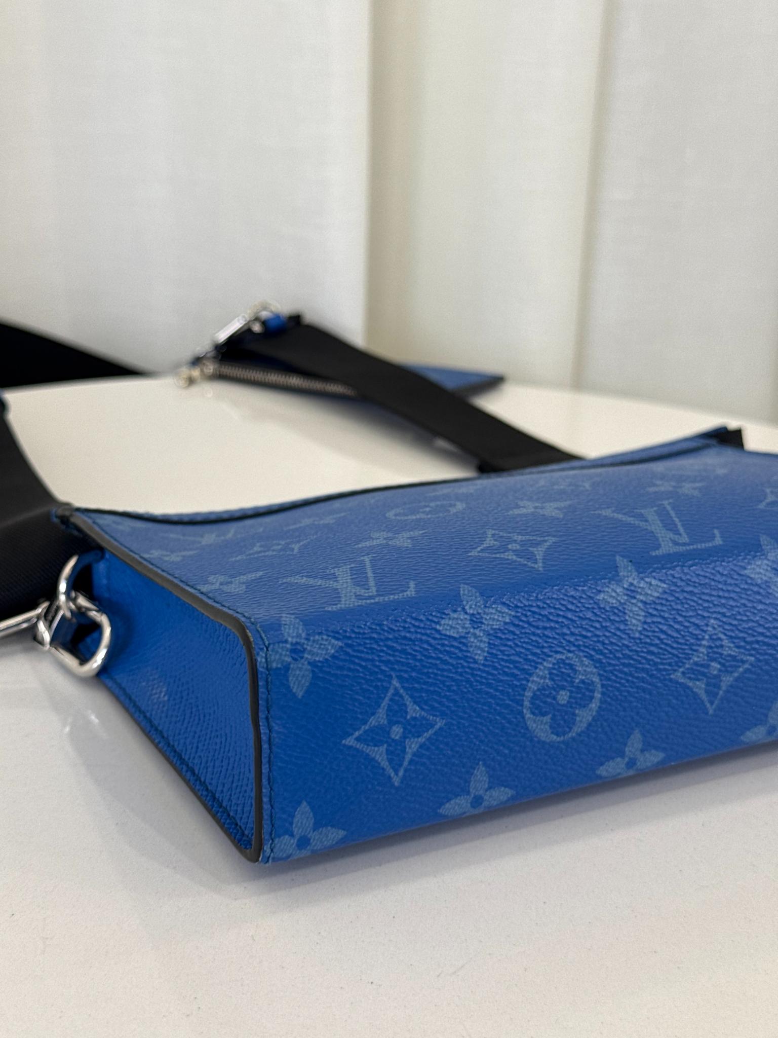 Louis Vuitton Men’s Gaston Wearable Wallet Blue Monogram Taigarama