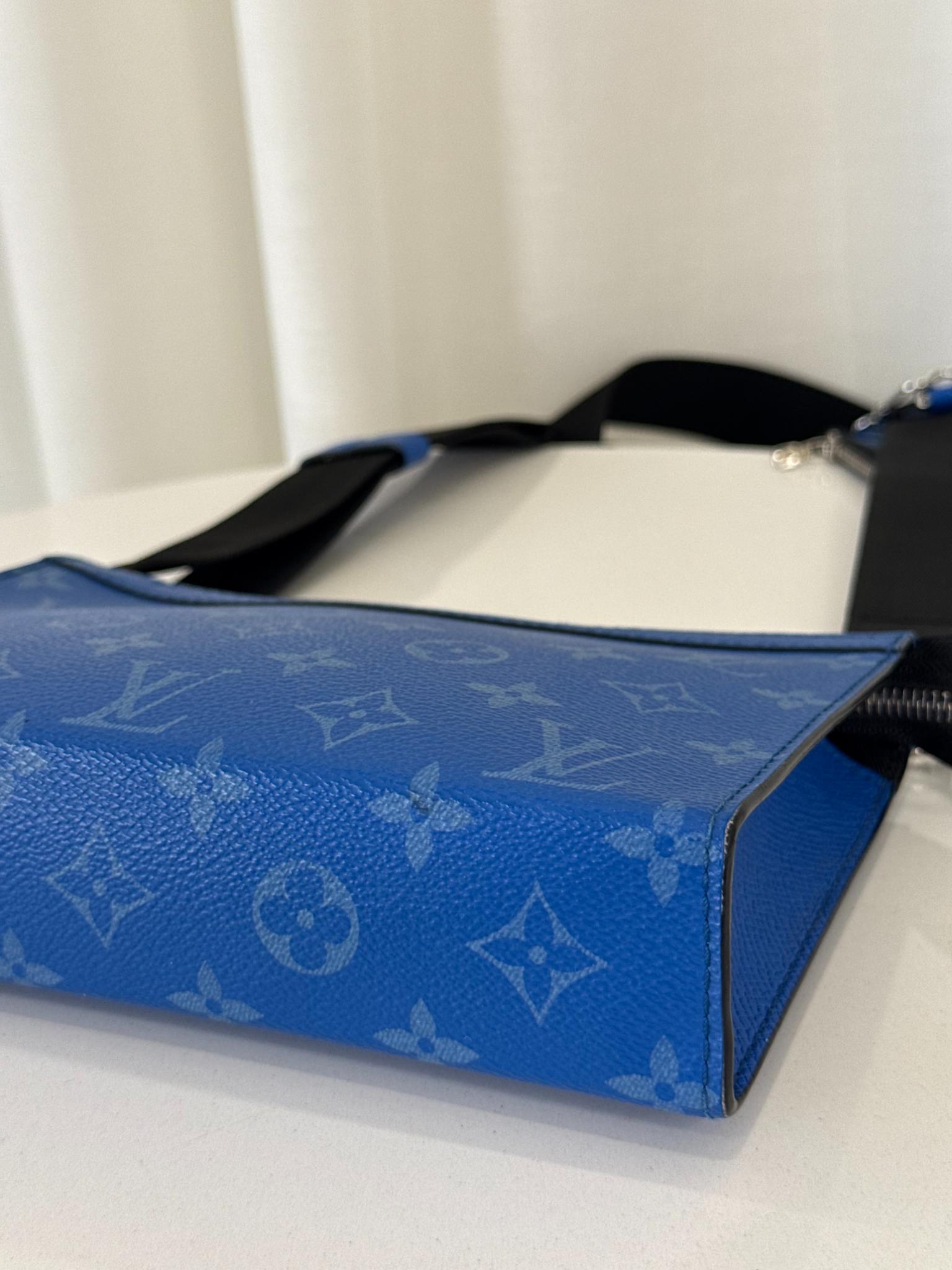 Louis Vuitton Men’s Gaston Wearable Wallet Blue Monogram Taigarama