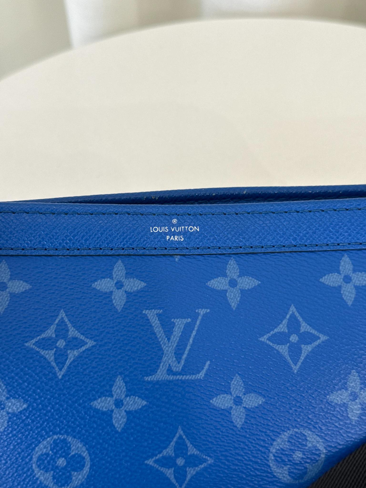 Louis Vuitton Men’s Gaston Wearable Wallet Blue Monogram Taigarama
