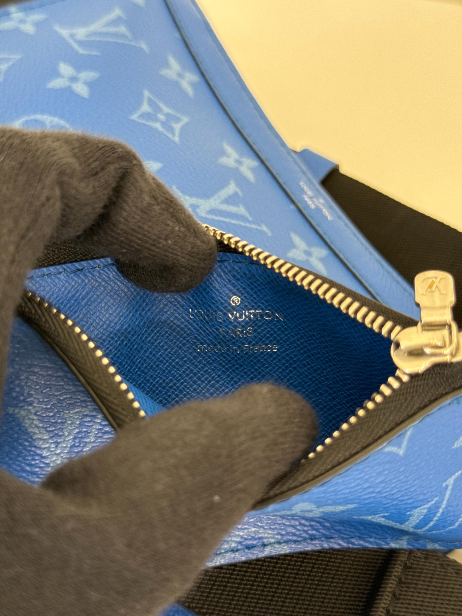 Louis Vuitton Men’s Gaston Wearable Wallet Blue Monogram Taigarama