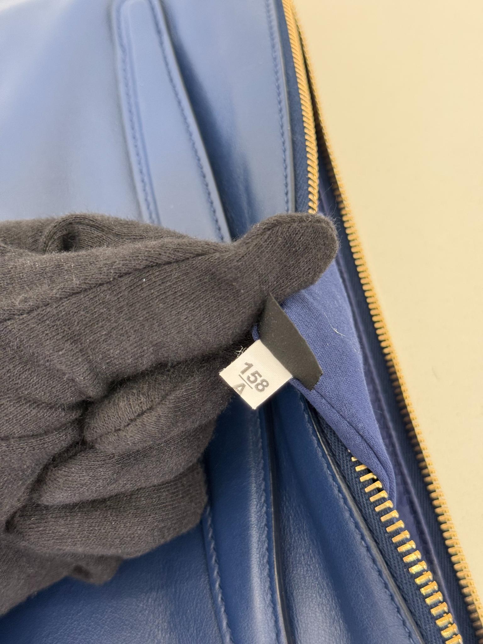Miu Miu Navy Blue Studded Leather Zip Clutch
